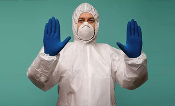 13man-in-protective-gear-gloves-mask-suit