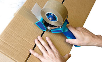 packing-box-with-tape-gun